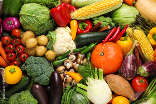 Different fresh vegetables as background  closeup view