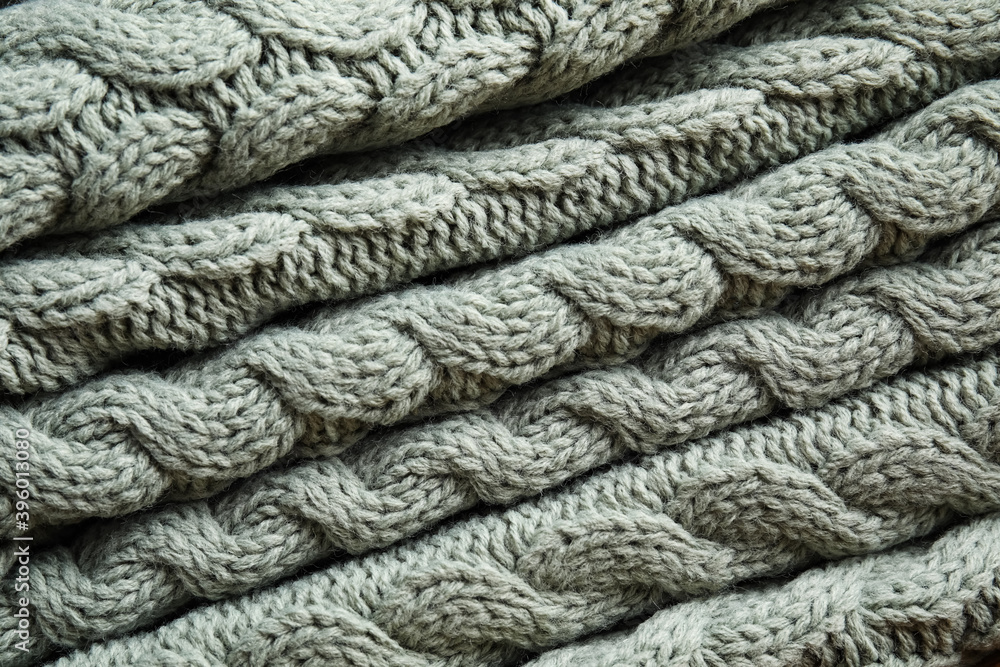 Soft knitted plaid as background, closeup view Soft knitted plaid as background, closeup view
