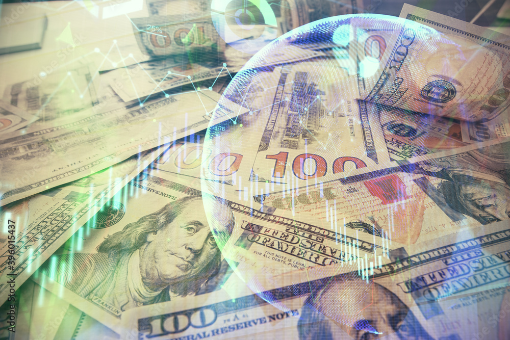 Multi exposure of forex chart drawing over us dollars bill background. Concept of financial success markets. Multi exposure of forex chart drawing over us dollars bill background. Concept of financial success markets.