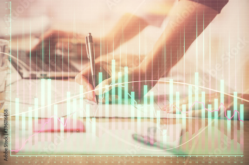 Multi exposure of woman hands typing on computer and financial chart hologram drawing. Stock market analysis concept.