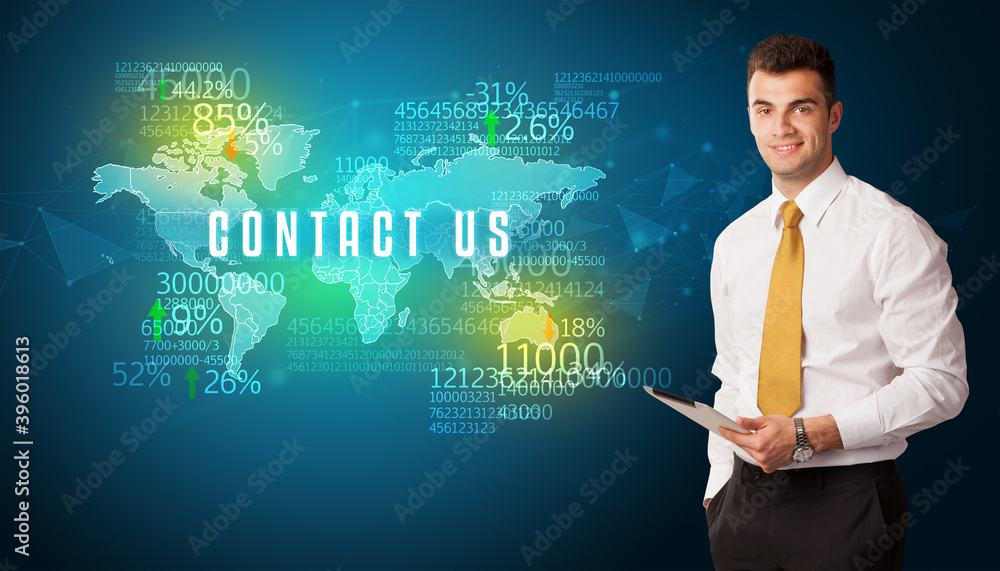 Businessman in front of a decision with CONTACT US inscription, business concept Businessman in front of a decision with CONTACT US inscription, business concept
