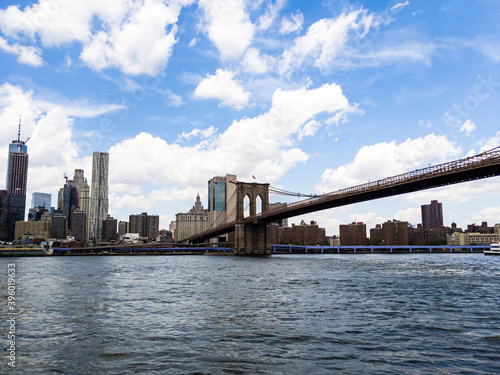 Brooklyn Bridge on cloudy summer day in New York City © Dot Slash Digital