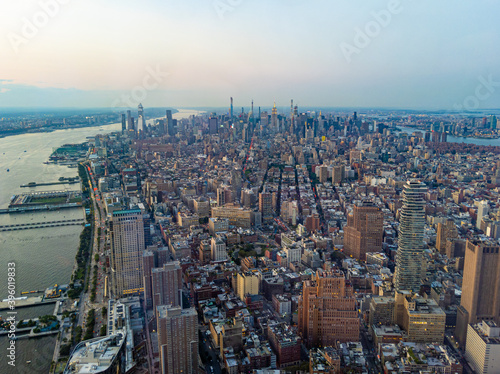 Aerial view of Manhattan New York City cityscape before sunset, view from One World Trade Center facing north © Dot Slash Digital
