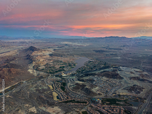 Aerial sunrise view of city edge of Las Vegas, Nevada on cloudy day