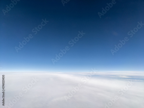 Aerial view above layer of altostratus clouds