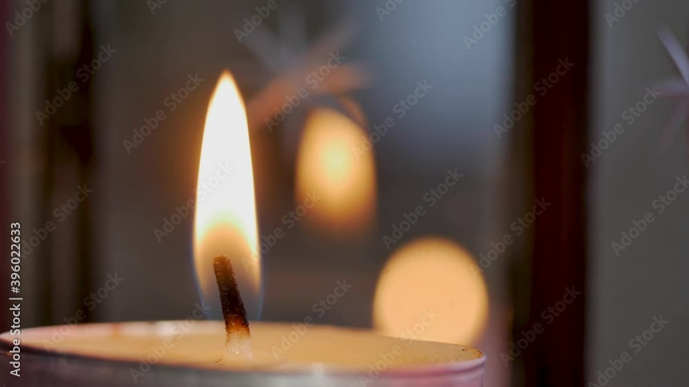 close up view footage of igniting a candle in the dark, candle position