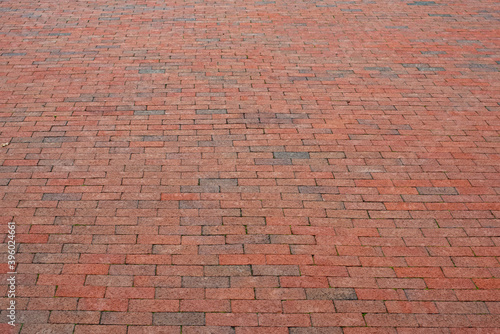 the road is lined with bricks