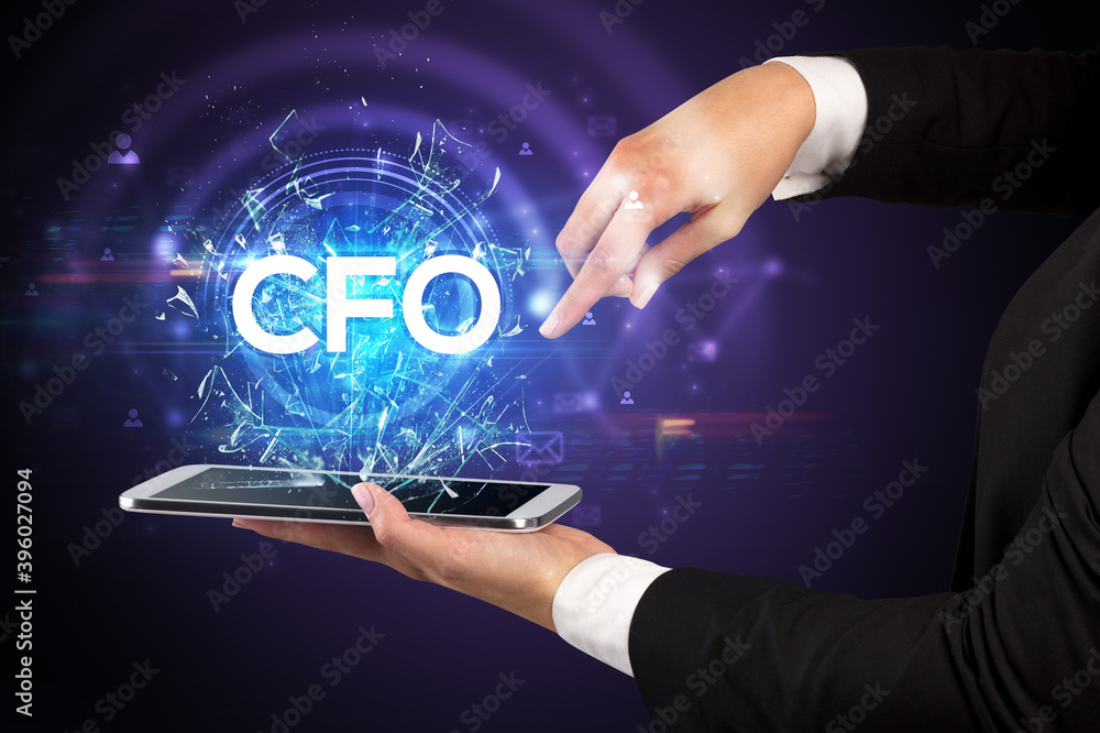 Close-up of a touchscreen with CFO abbreviation, modern technology concept Close-up of a touchscreen with CFO abbreviation, modern technology concept