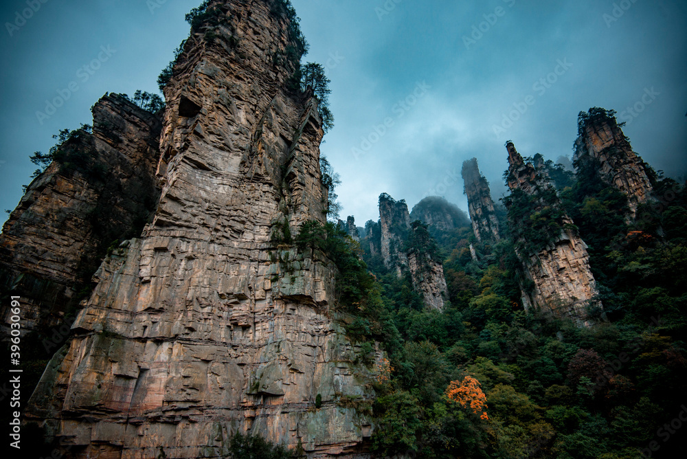 Amazing landscape of mountain and forest in the foggy at Wulingyuan, Hunan, China. Wulingyuan Scenic and Historic Interest Area which was designated a UNESCO World Heritage Site in China