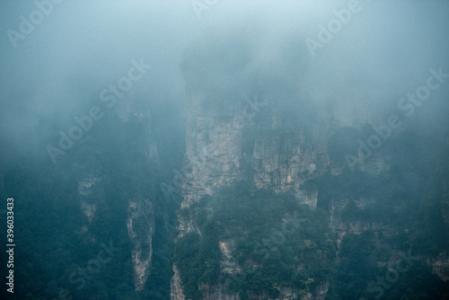 the mountain and forest in foggy at at Wulingyuan. Wulingyuan Scenic and Historic Interest Area which was designated a UNESCO World Heritage Site as well as an AAA scenic area in china.