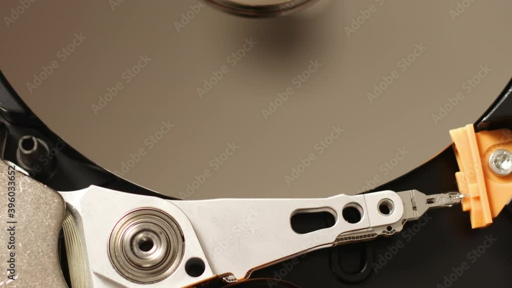 Macro close up of Internal Structure of HDD working hard disk Macro close up of Internal Structure of HDD working hard disk