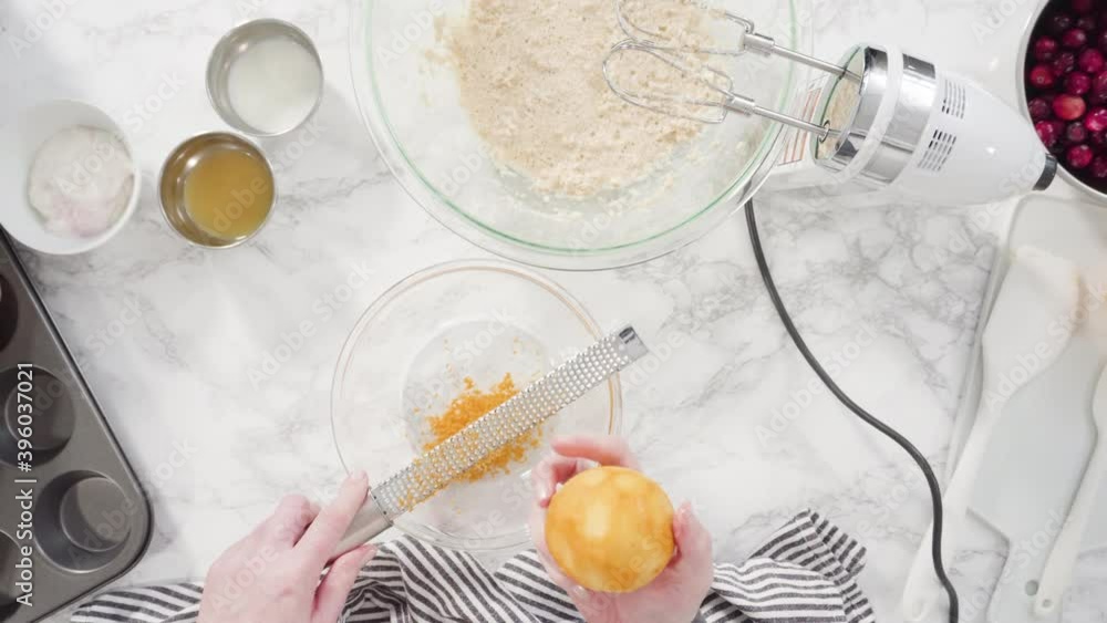 Flat lay. Step by step. Mixing ingredients in a mixing bowl to bake cranberry muffins. Flat lay. Step by step. Mixing ingredients in a mixing bowl to bake cranberry muffins.