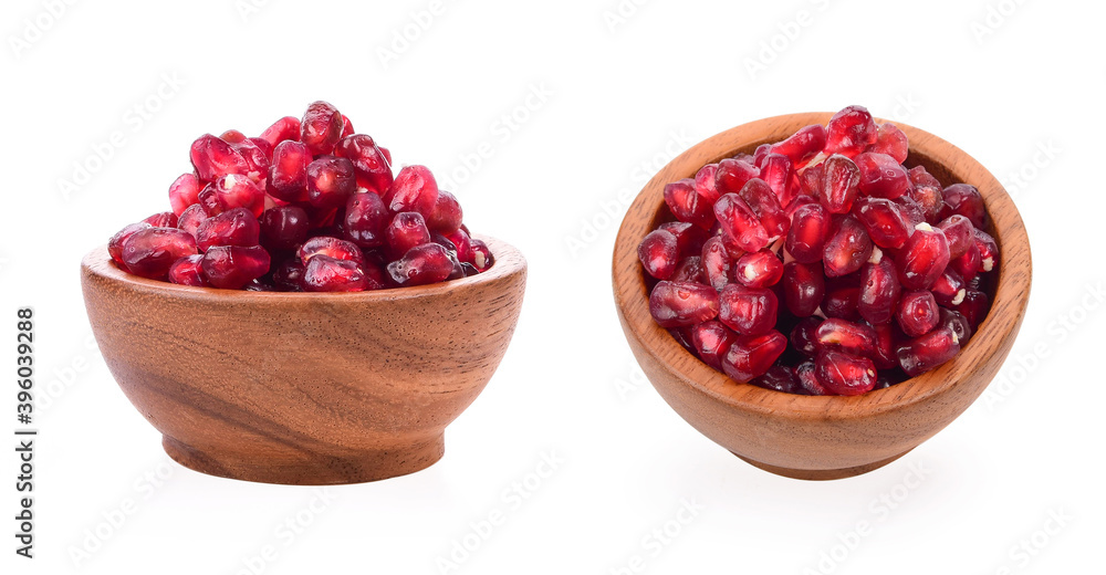 Fruit pomegranate in wood bowl on white background Fruit pomegranate in wood bowl on white background