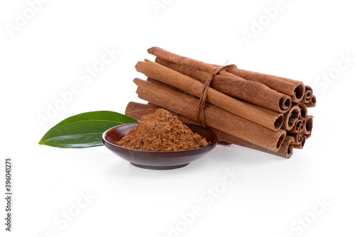 Cinnamon dried peel and powder isolated on a white background.