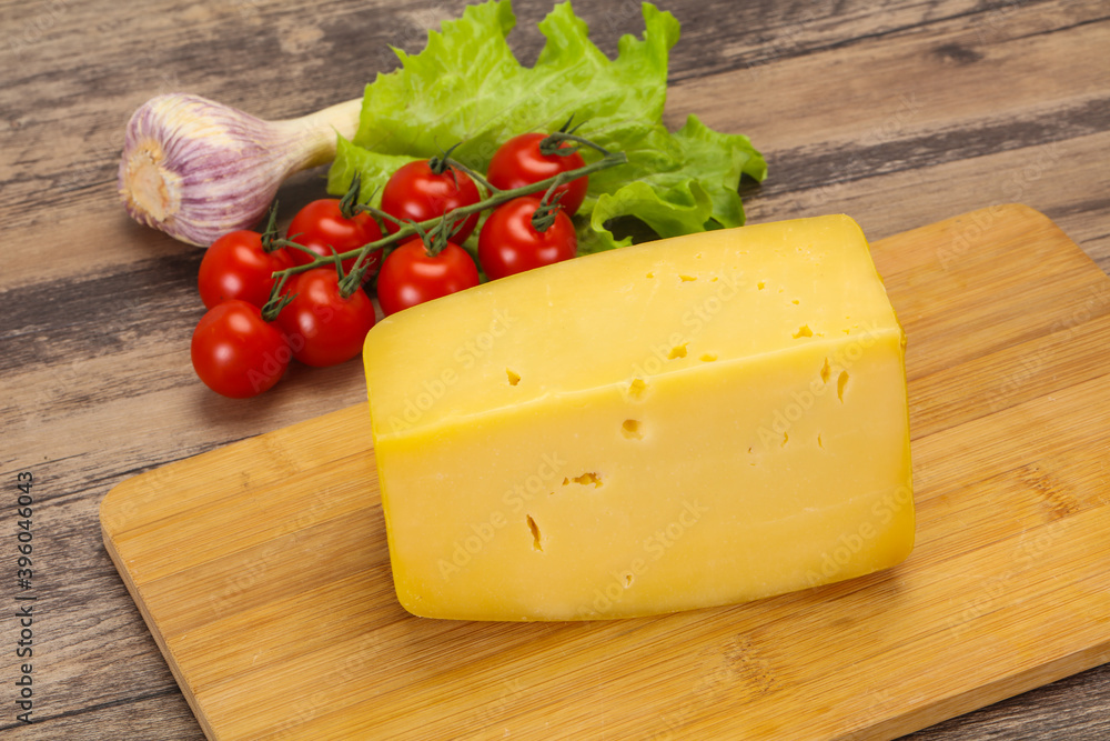 Hard yellow tasty cheese brick Hard yellow tasty cheese brick