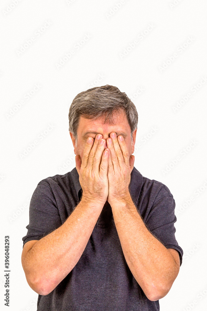 mature man slapping hands in front of the face mature man slapping hands in front of the face