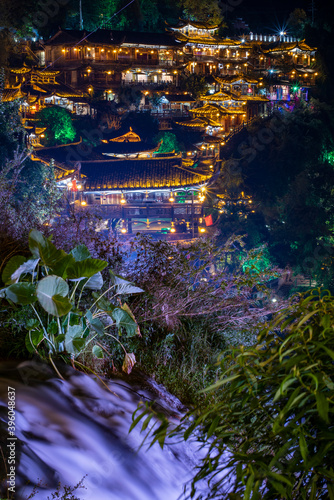 Fototapeta Naklejka Na Ścianę i Meble -   Furong Ancient Town illuminated at night. Amazing beautiful landscape scene of Furong Ancient Town (Furong Zhen, Hibiscus Town), China