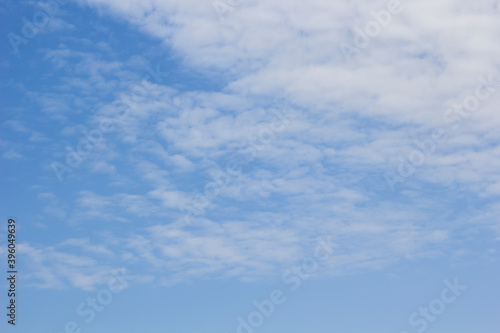 White cloudy on blue sky background at noon