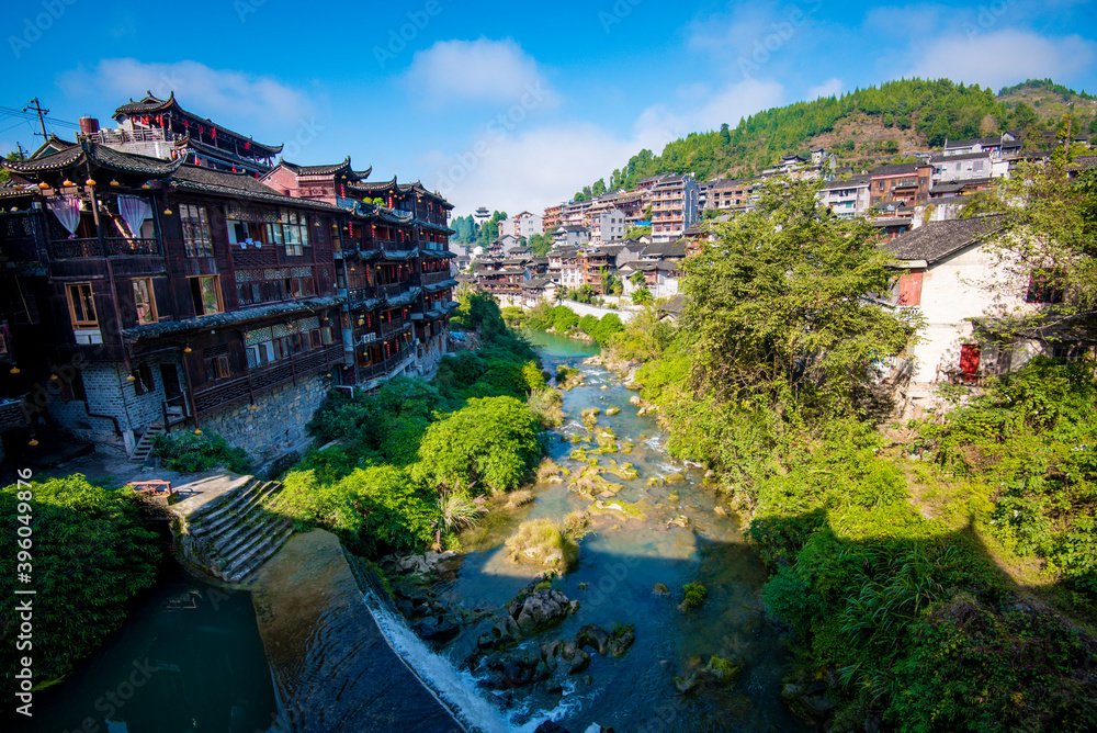  Street view local visitor and tourist in Furong Ancient Town (Furong Zhen, Hibiscus Town), China. Furong Ancient Town is famous tourism attraction place.