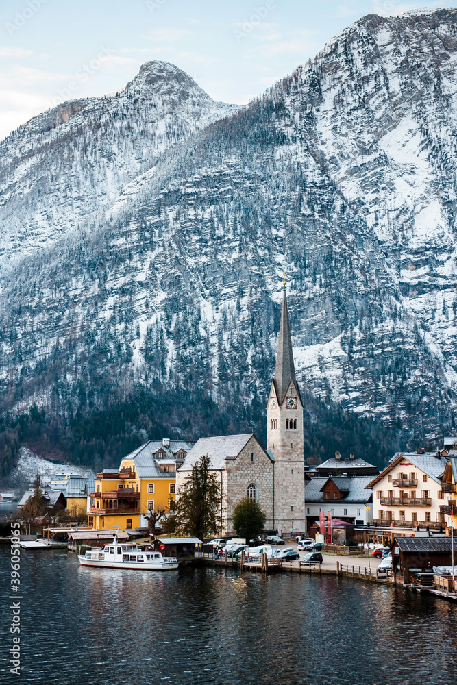 Scenic view of town Hallstatt with snowy Alps