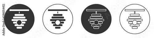 Black Hive for bees icon isolated on white background. Beehive symbol. Apiary and beekeeping. Sweet natural food. Circle button. Vector.
