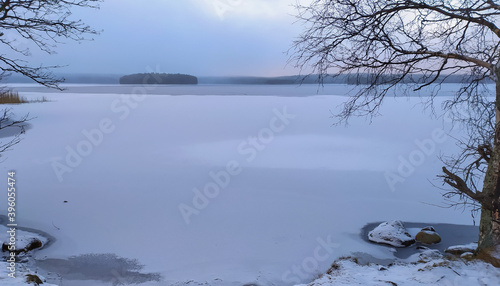 Russia  Karelia  Kostomuksha. Here is lake Kontokki at the dawn hour of a winter day.November 25  2020.