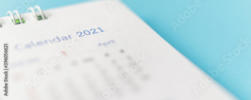 2021 calendar page on blue background business planning appointment meeting concept