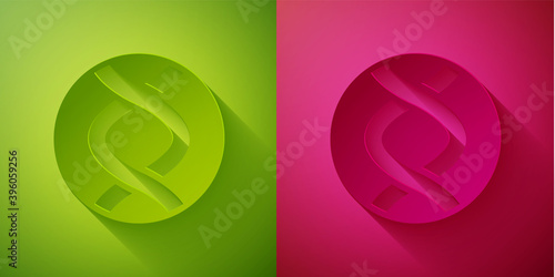 Paper cut DNA symbol icon isolated on green and pink background. Genetic engineering, genetics testing, cloning, paternity testing. Paper art style. Vector.