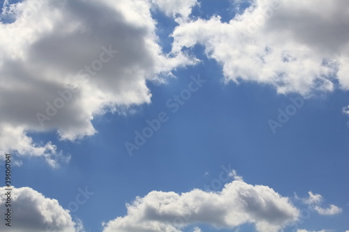Beautiful background created from blue sky in the center and clouds around the edges