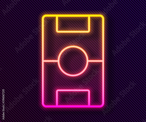 Glowing neon line Football table icon isolated on black background. Hockey table. Vector.