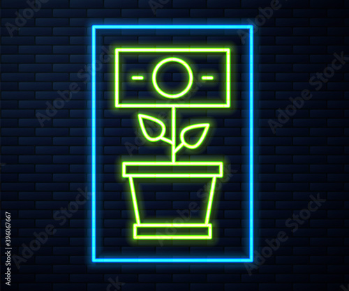 Glowing neon line Money plant in the pot icon isolated on brick wall background. Business investment growth concept. Money savings and investment. Vector.