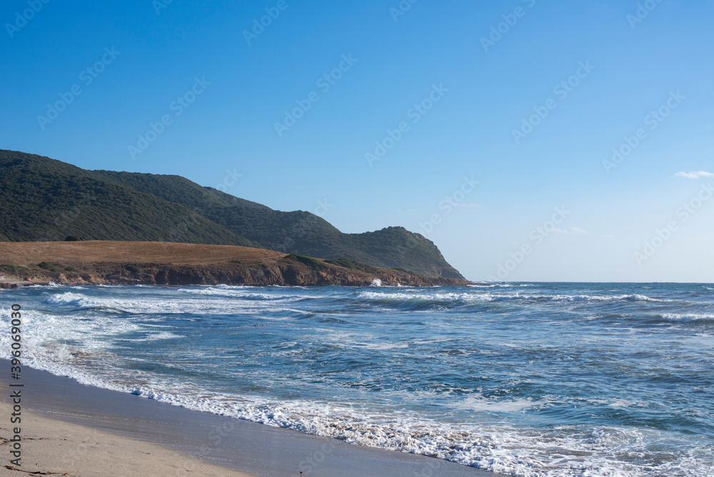 view of a surfer beach in Corsica, the best place for sunset photos of the bloodthirsty islands, landscapes and panoramas unique in the world