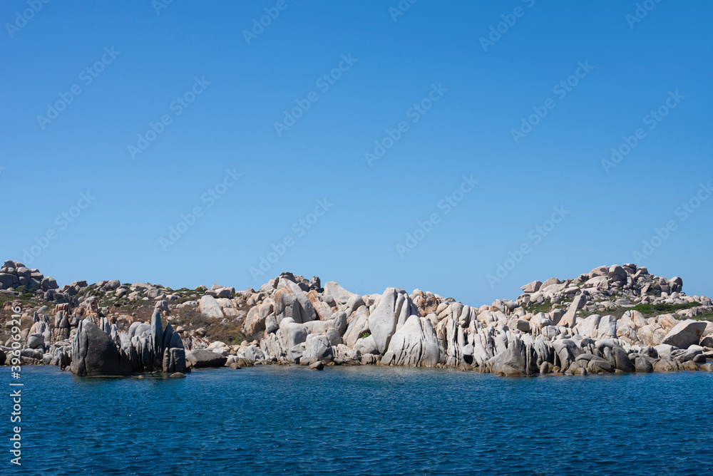 View of many large magnificent rocks of the Lavezzi islands in southern Corsica after Bonifacio, a short tour by tourist boat to arrive on the beach with turquoise water