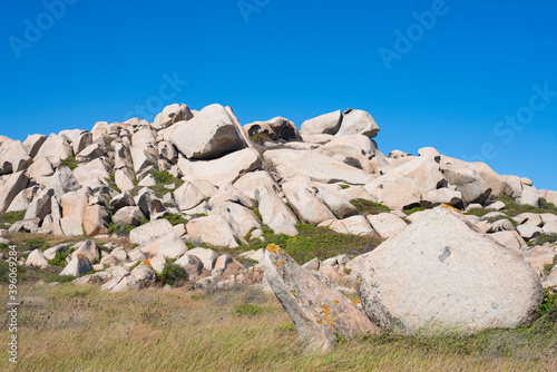 View of many large magnificent rocks of the Lavezzi islands in southern Corsica after Bonifacio, a short tour by tourist boat to arrive on the beach with turquoise water