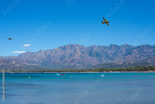 bomber plane on the beach of calvi for the fire in the mountains