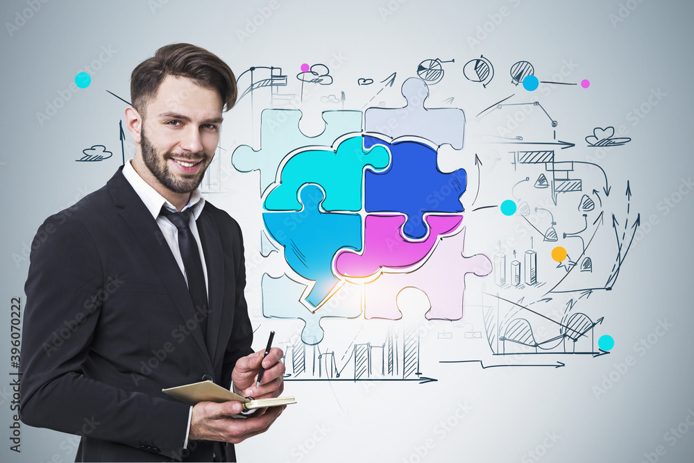 Smiling man with planner and puzzle sketch Smiling man with planner and puzzle sketch