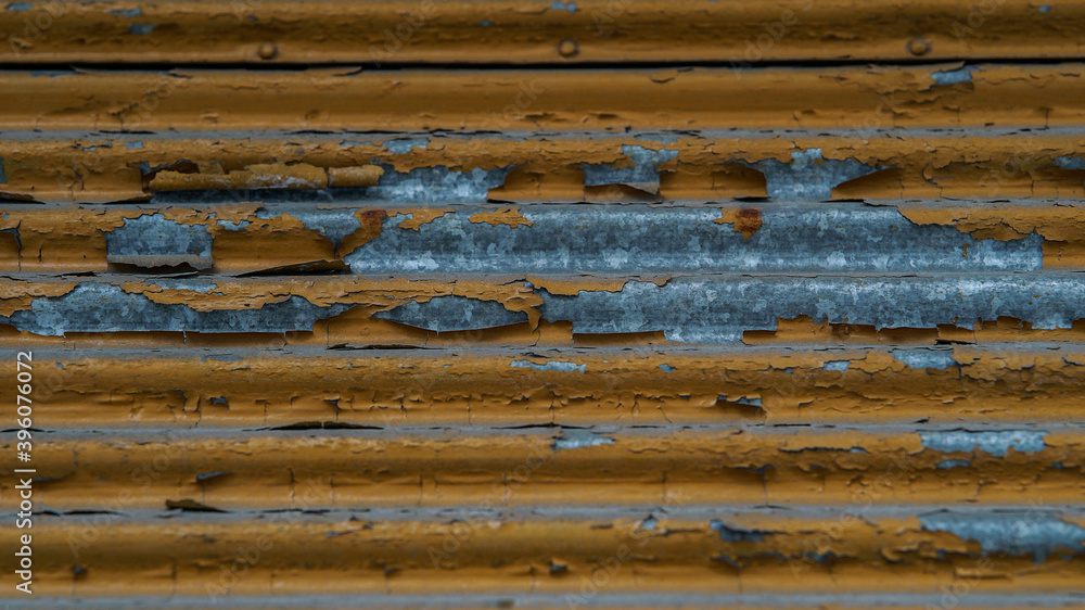 Naklejka premium rusty and stripped orange iron background 