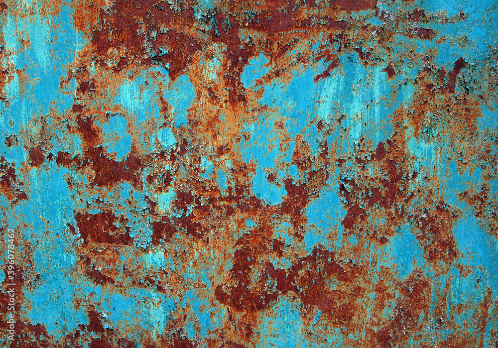 Rusty steel sheet with remnants of paint