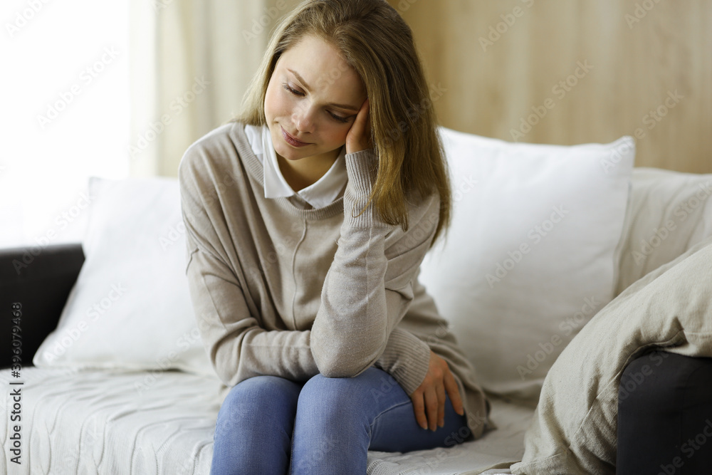 Tired upset woman worried about tiredness from work at home office and self isolation quarantine for COVID-19 Coronavirus. Mental health, anxiety depressed thinking young lady Tired upset woman worried about tiredness from work at home office and self isolation quarantine for COVID-19 Coronavirus. Mental health, anxiety depressed thinking young lady