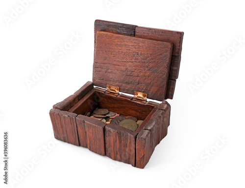 Old wooden box with old coins