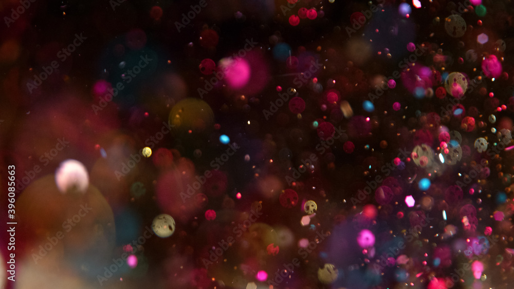 Abstract Neon Glitters Background with Bokeh Defocused Lights
