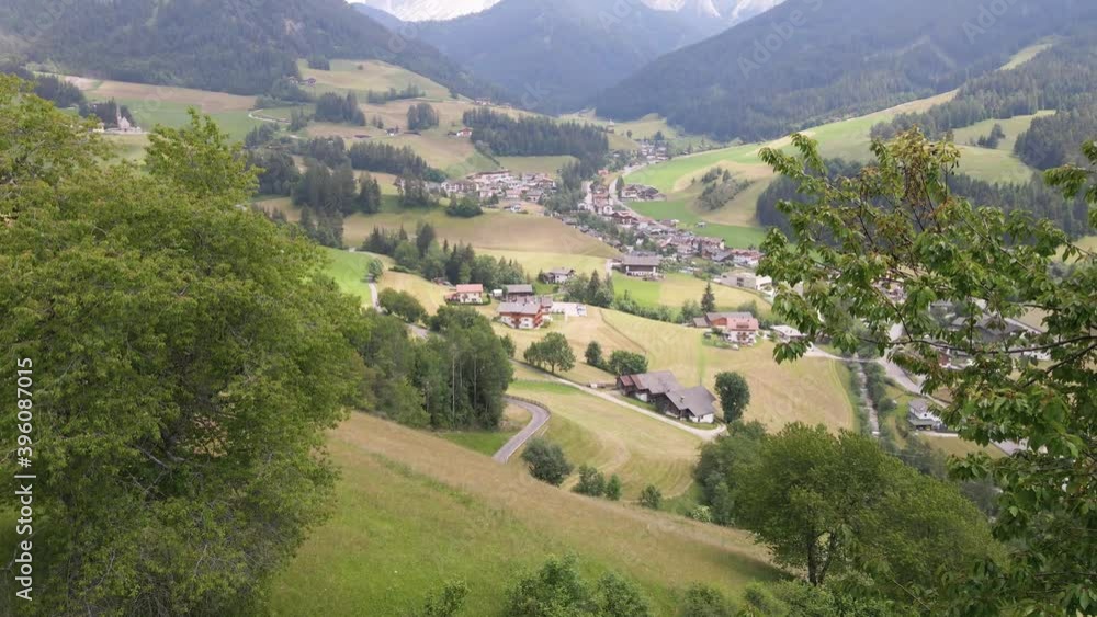 Slow Reveal Aerial of the Quaint Town of St. Magdalena in the Alps, Dolomites, Italy Slow Reveal Aerial of the Quaint Town of St. Magdalena in the Alps, Dolomites, Italy