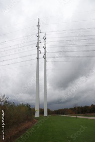 Wintrack power line towers in white color in the Bentwoud recreation area photo