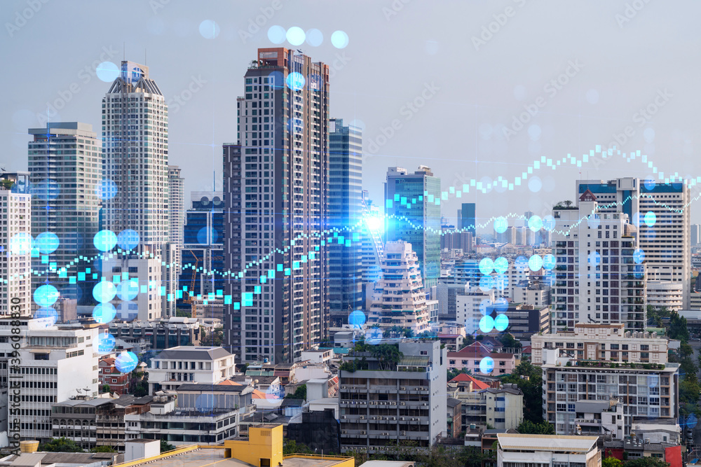 Obraz premium Forex and stock market chart hologram over panorama city view of Bangkok, the financial center in Asia. The concept of international trading. Double exposure.