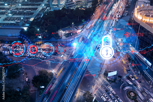 Foto Padlock icon hologram on aerial view of road, busy urban traffic highway at night