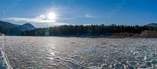 freezing mana river, ice and sludge on the water. beautiful nature of Siberia, panorama photo