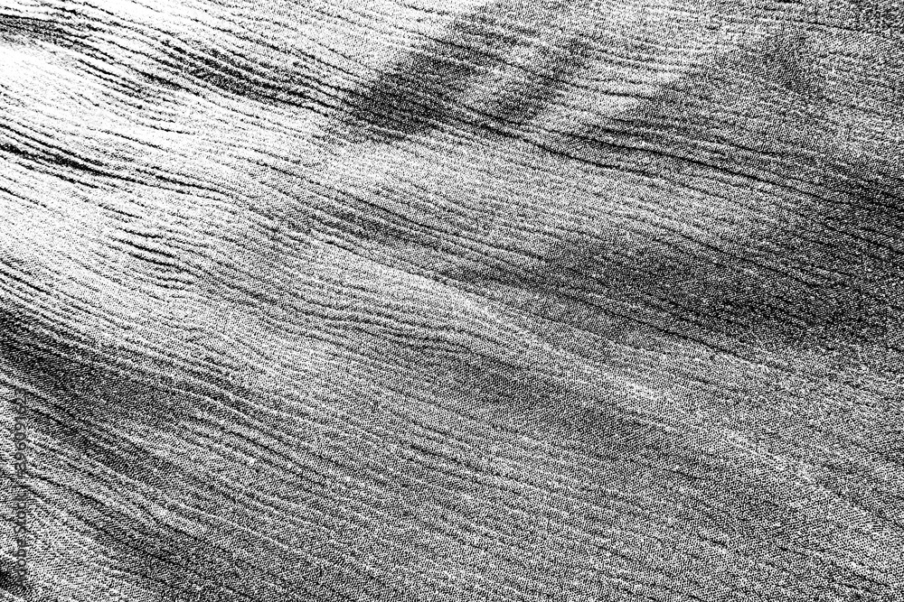 Obraz premium Light black gray one-color monochromatic rough fabric, textile with folds. Dust, threads glitters on fabrics, on clothes.