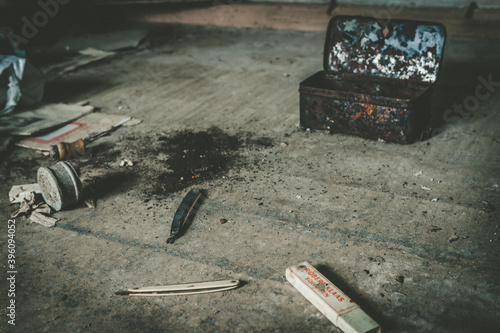 Old razor blades in an abandoned house © mindscapephotos
