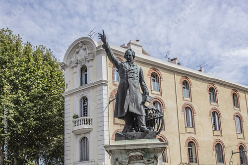 Statue of Francois Arago (sculptor Antonin Mercie, 1879) in Perpignan Place Arago. Francois Arago - French political leader, astronomer and physicist. Perpignan, Pyrenees-Orientales, France. photo