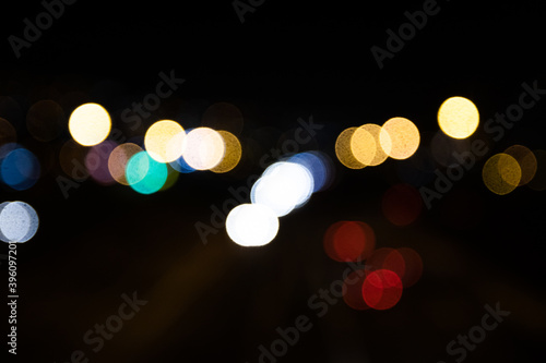 Blurred out of focus colorful lights from the cars on the motorway © Eimantas